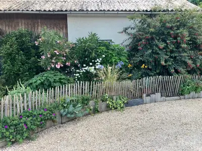 Jardin de l'établissement Chambre chez Armelle