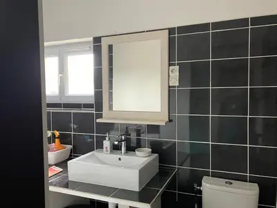 Salle de bains dans l'établissement Chambre chez Armelle