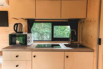 Cuisine ou kitchenette dans l'établissement Paradise Home by Tiny Away