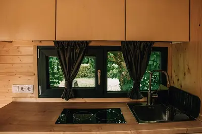 Cuisine ou kitchenette dans l'établissement Garden Home by Tiny Away