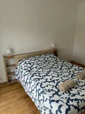 Un ou plusieurs lits dans un hébergement de l'établissement Appartement proche de Tours