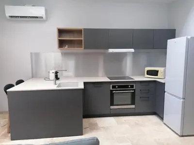 Cuisine ou kitchenette dans l'établissement Appartement en plein coeur de Contres