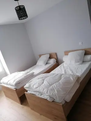 Un ou plusieurs lits dans un hébergement de l'établissement Appartement en plein coeur de Contres