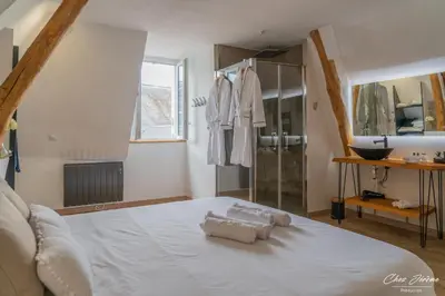 Un ou plusieurs lits dans un hébergement de l'établissement Amboise et Volupté centre-ville
