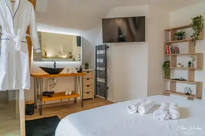 Un ou plusieurs lits dans un hébergement de l'établissement Amboise et Volupté centre-ville