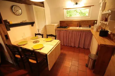 Cuisine ou kitchenette dans l'établissement Le chant du coucou