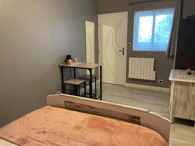 Coin salon dans l'établissement L'Escale Arc-en-Ciel