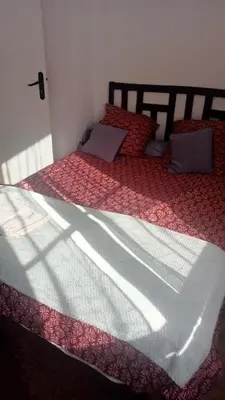 Un ou plusieurs lits dans un hébergement de l'établissement Chambre individuelle chez l'habitant pour une personne