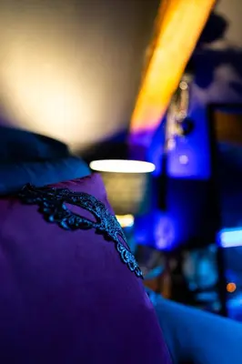 Un ou plusieurs lits dans un hébergement de l'établissement L'Évasion, Romantisme, volupté & jacuzzi