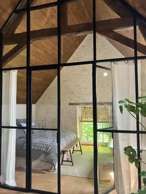 Coin salon dans l'établissement Maison de vacances avec piscine chauffée, jacuzzi et jardin privé - proche circuit des 24h du Mans
