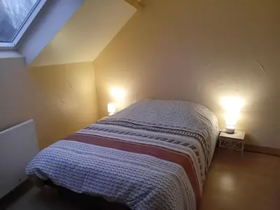Un ou plusieurs lits dans un hébergement de l'établissement Maisons du château