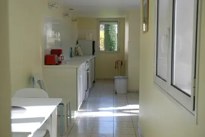 Cuisine ou kitchenette dans l'établissement A l'abri du Ginkgo