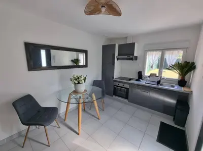 Télévision ou salle de divertissement dans l'établissement Maison cosy aux portes de Tours