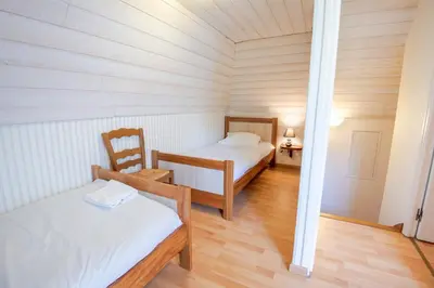 Un ou plusieurs lits dans un hébergement de l'établissement La petite maison sur la colline