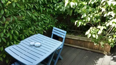 Jardin de l'établissement Logement cosy proche gare avec terrasse de verdure