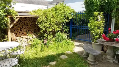 Jardin de l'établissement Logement cosy proche gare avec terrasse de verdure