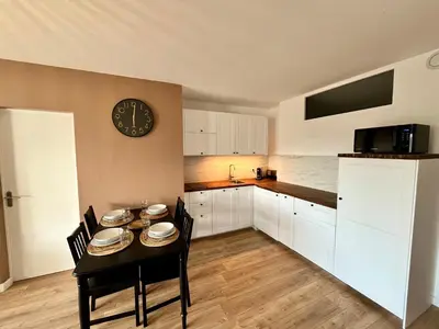 Cuisine ou kitchenette dans l'établissement Chez Béranger - proche Gare et Palais des Congrès