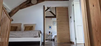 Un ou plusieurs lits dans un hébergement de l'établissement Ma Demoiselle d'Oé - maison climatisée -3 étoiles