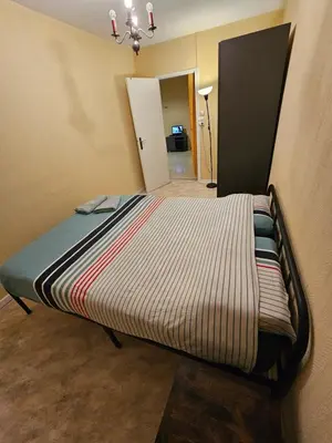 Un ou plusieurs lits dans un hébergement de l'établissement Appartement T4 à 40min à pieds de la gare de Saint-Pierre des corps