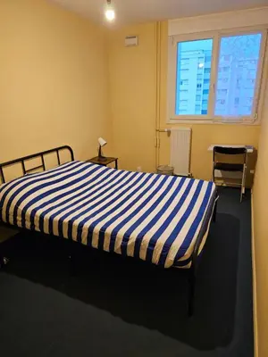 Un ou plusieurs lits dans un hébergement de l'établissement Appartement T4 à 40min à pieds de la gare de Saint-Pierre des corps
