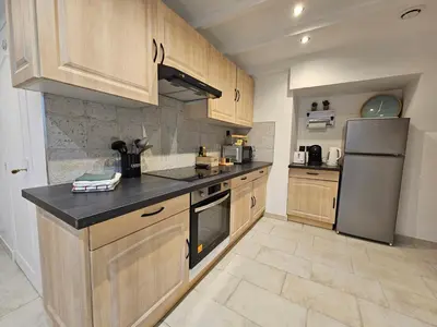 Cuisine ou kitchenette dans l'établissement Gîte Beau-Vallon