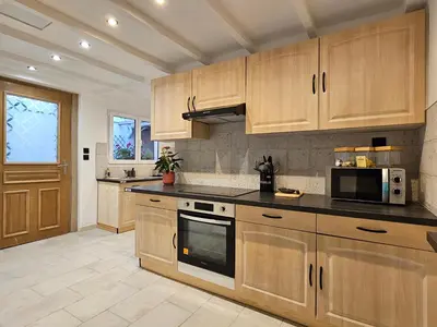 Cuisine ou kitchenette dans l'établissement Gîte Beau-Vallon