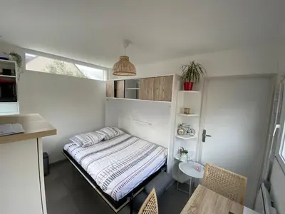 Un ou plusieurs lits dans un hébergement de l'établissement gîte cosy Le Mans
