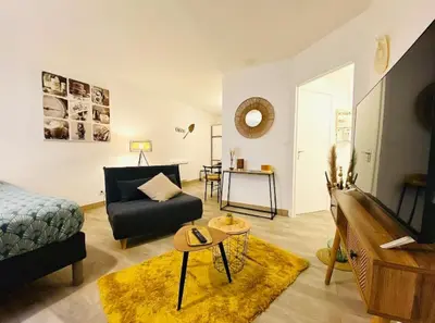 Coin salon dans l'établissement Appartement Centre-Ville - 3 Voyageurs