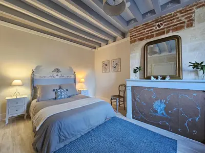 Un ou plusieurs lits dans un hébergement de l'établissement Regard sur le château
