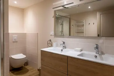 Salle de bains dans l'établissement Le Petit Munet