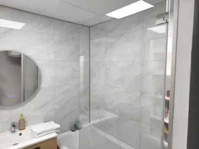 Salle de bains dans l'établissement Magnifique Studio Douillet