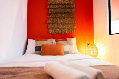 Un ou plusieurs lits dans un hébergement de l'établissement Studio design et coloré au coeur de Saumur