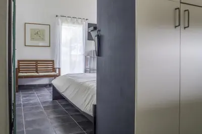 Un ou plusieurs lits dans un hébergement de l'établissement Maison de campagne sud Touraine avec piscine 8px