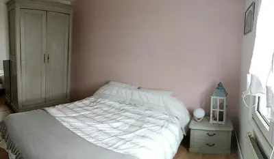 Un ou plusieurs lits dans un hébergement de l'établissement Appartement proche circuit 24 h du Mans