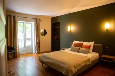 Un ou plusieurs lits dans un hébergement de l'établissement Villa luxueuse - La maison des pilotes - 50 m du circuit des 24h du Mans