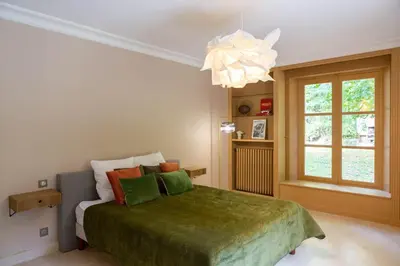 Un ou plusieurs lits dans un hébergement de l'établissement Villa luxueuse - La maison des pilotes - 50 m du circuit des 24h du Mans