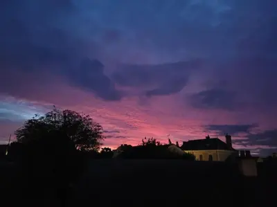 Lever ou coucher de soleil vu de la maison de vacances ou à proximité