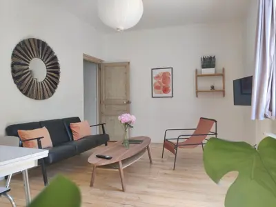 Coin salon dans l'établissement Grand Appart neuf, calme, wifi
