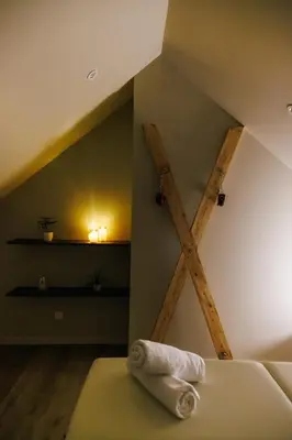 Un ou plusieurs lits dans un hébergement de l'établissement Eden Room - Luxe, Balnéo & Sauna