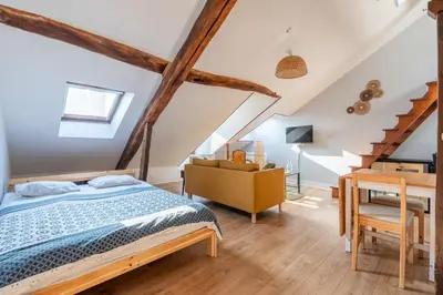 Un ou plusieurs lits dans un hébergement de l'établissement Le cocon - Appartement en hyper centre