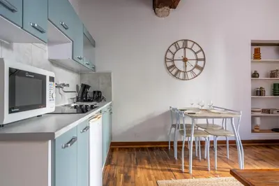 Cuisine ou kitchenette dans l'établissement Le nid des rois - Terrasse en hyper centre
