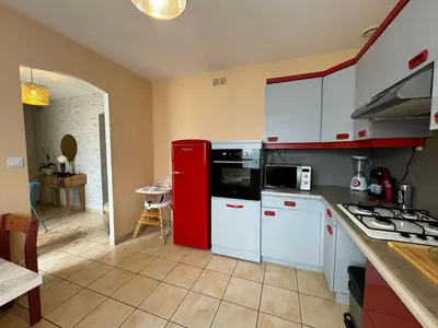 Cuisine ou kitchenette dans l'établissement Le coin des familles