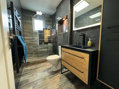 Salle de bains dans l'établissement Le coin des familles