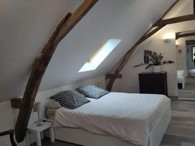 Un ou plusieurs lits dans un hébergement de l'établissement Le sablon chambres d'hotes