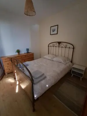 Un ou plusieurs lits dans un hébergement de l'établissement BRS Appartment
