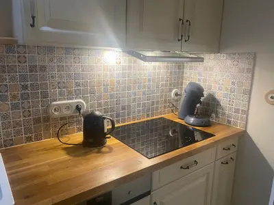 Cuisine ou kitchenette dans l'établissement Gite bois des songes