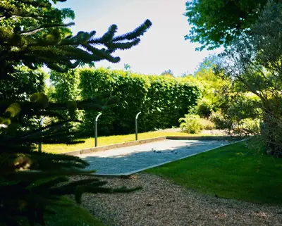 Jardin de l'établissement Gîte du Soleil dans la Ruelle - La Grouas