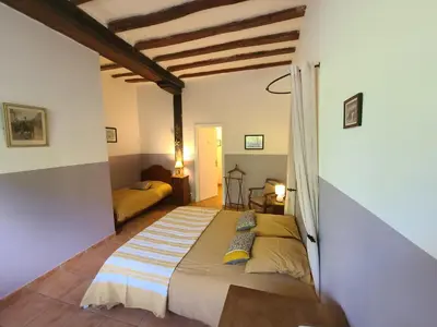 Un ou plusieurs lits dans un hébergement de l'établissement Chambres d'Hôtes du Clos de la Touche - Piscine chauffée