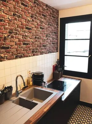 Cuisine ou kitchenette dans l'établissement Superbe appartement T3 dans l'hyper centre