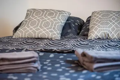 Un ou plusieurs lits dans un hébergement de l'établissement Spacieux & Familial 3 chambres proche gare